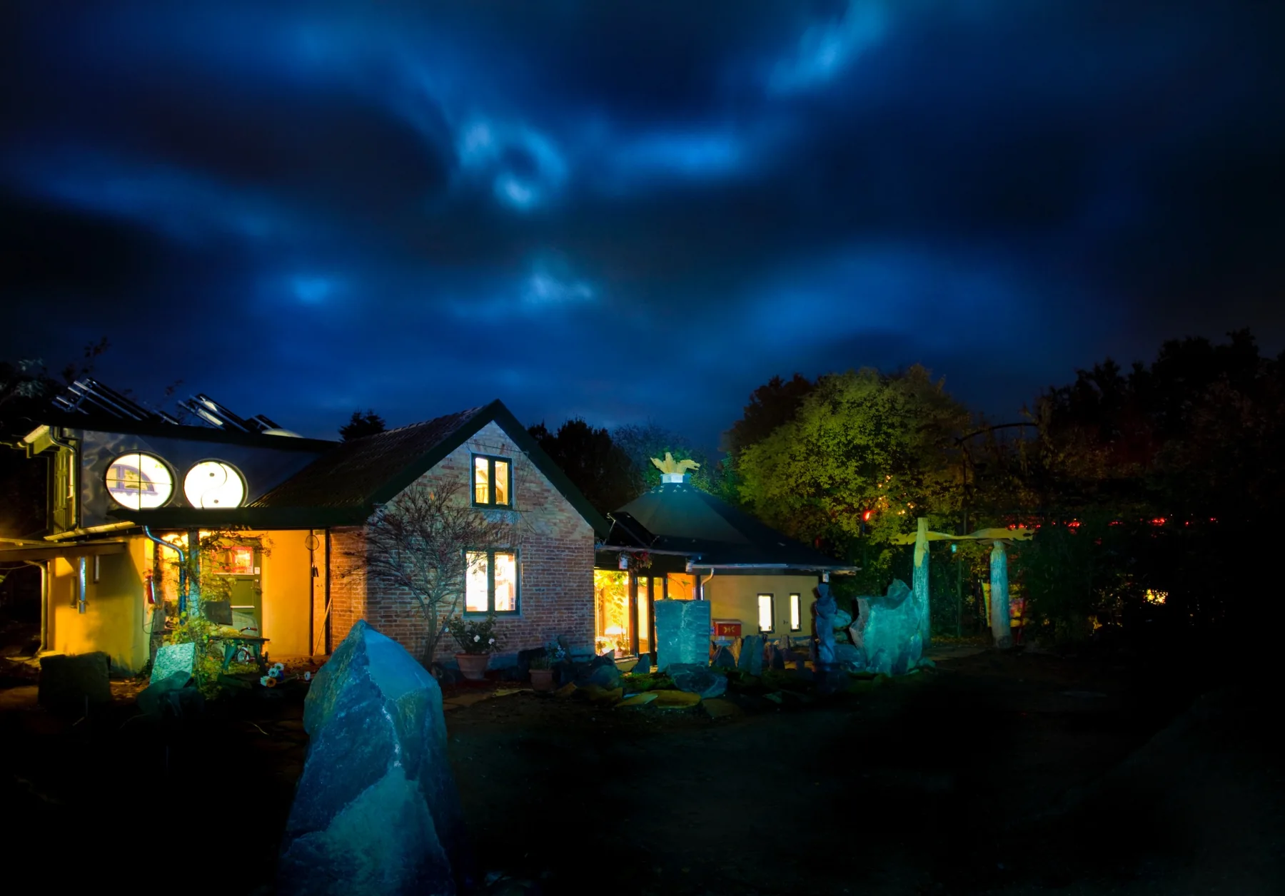 Axis Mundi Studio and The Magic Garden at night
